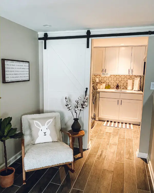 A barn door is a great addition to a laundry room.