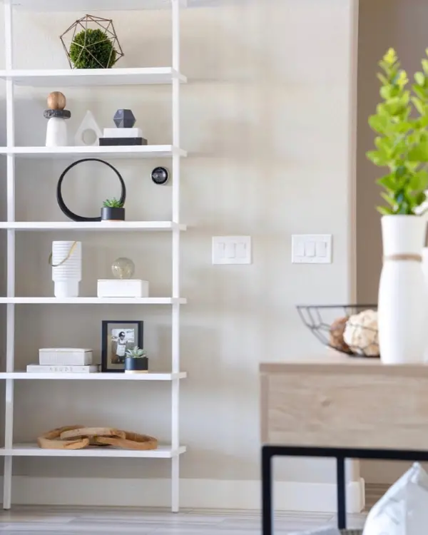 She used geometric shapes when styling her shelves,