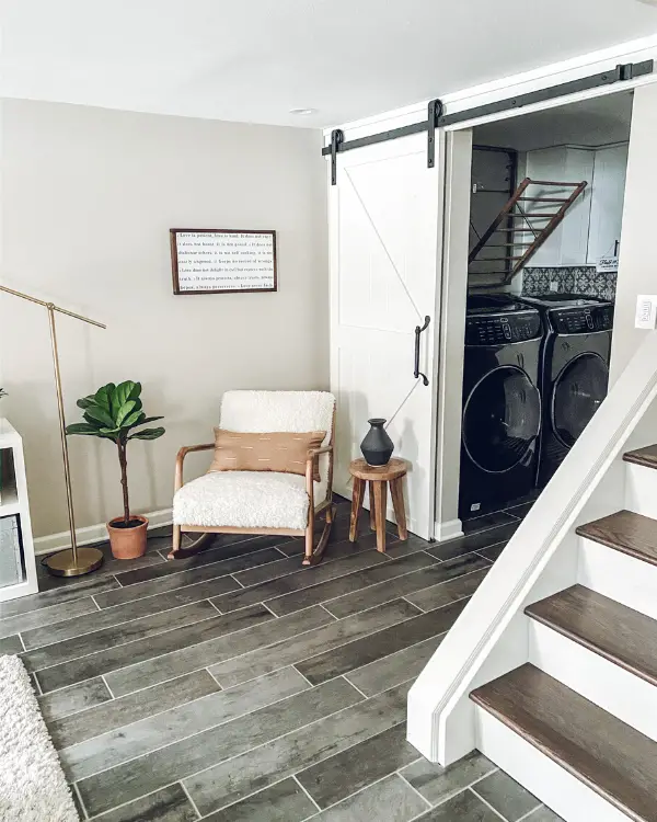 barn door to the laundry room in the basement