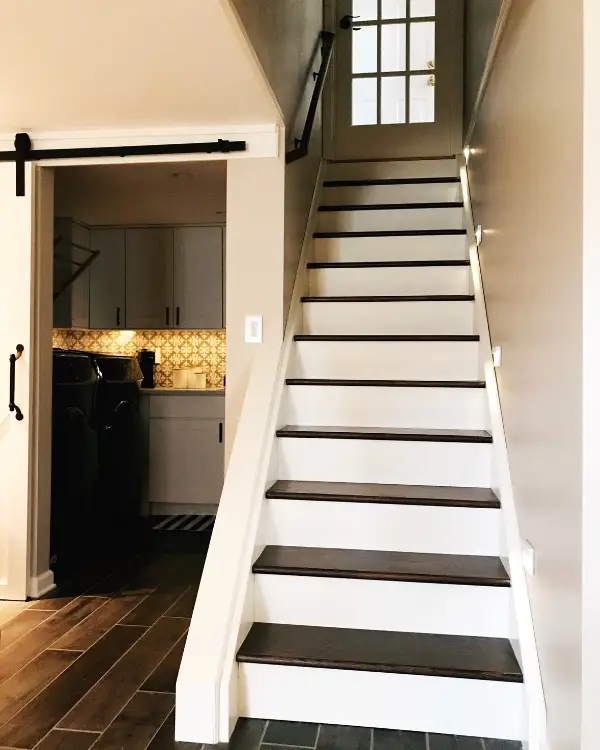 You won't regret adding stair lights when finishing a basement.