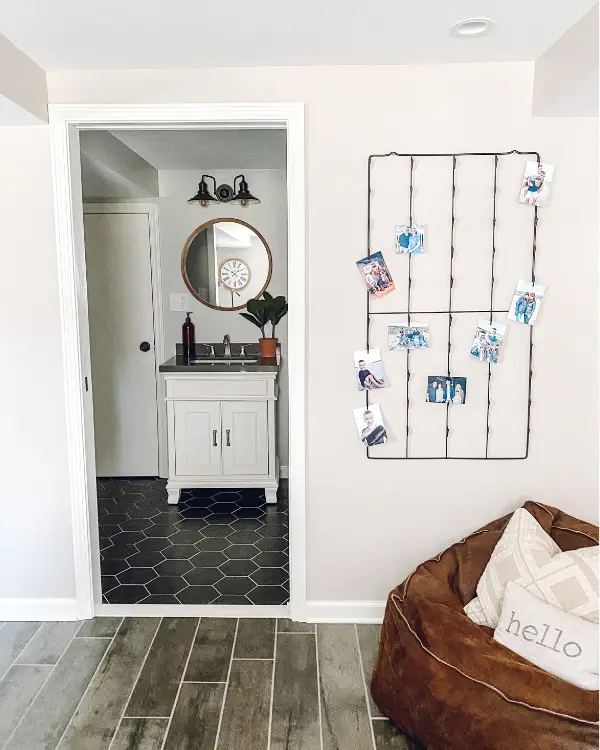 You won't regret using a pocket door to the bathroom in the basement.