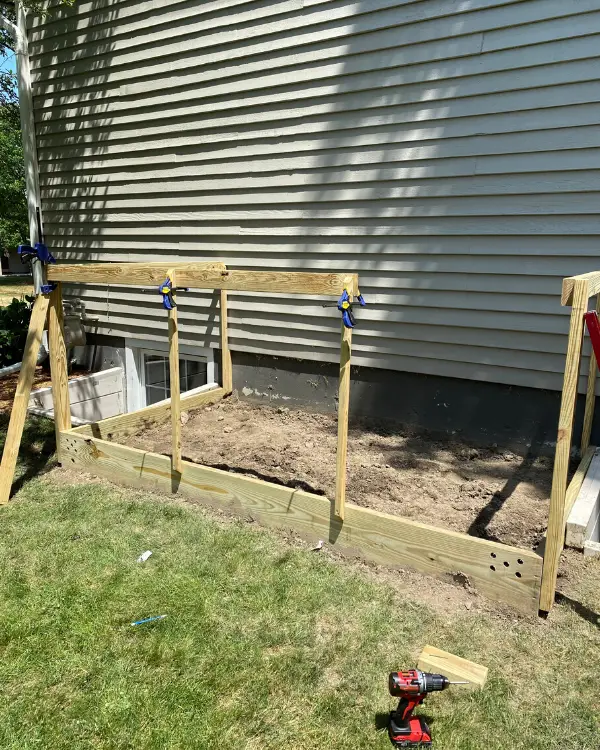 Attaching the balusters to the garden fence