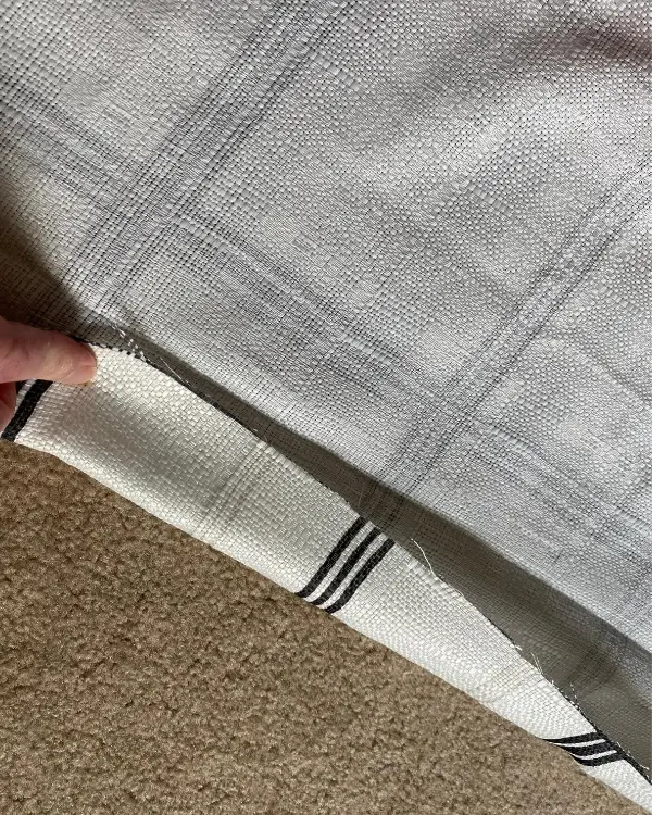 folding down the edge against the crease