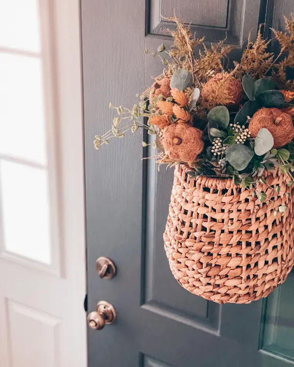 Pumpkin stems in a hanging basket for Fall