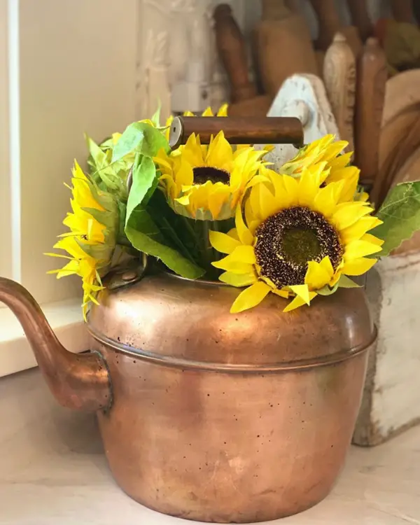 Sunflowers and copper are simple ways to decorate for Fall!