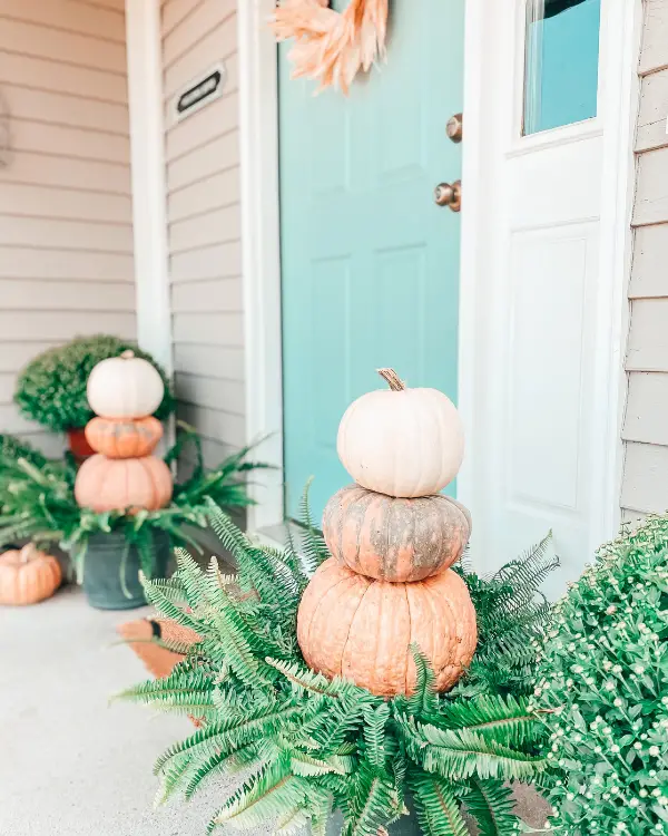 pumpkins stacks on the front porch