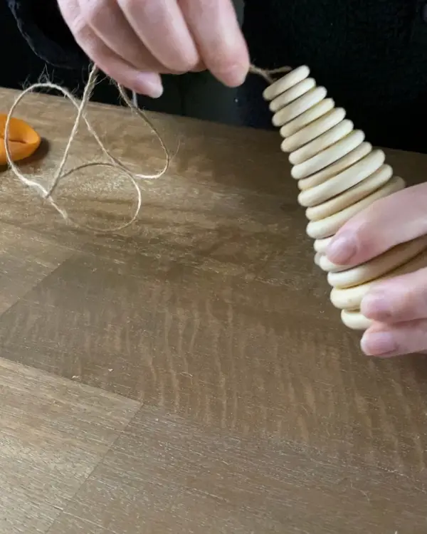 Adding string to make it an ornament for hanging
