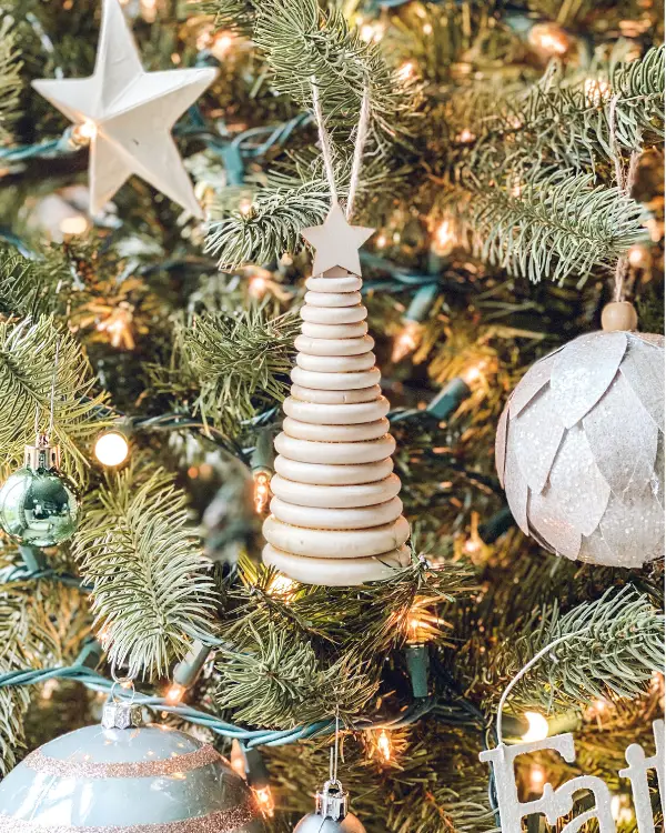 The DIY Wooden Christmas Tree Ornament on the tree