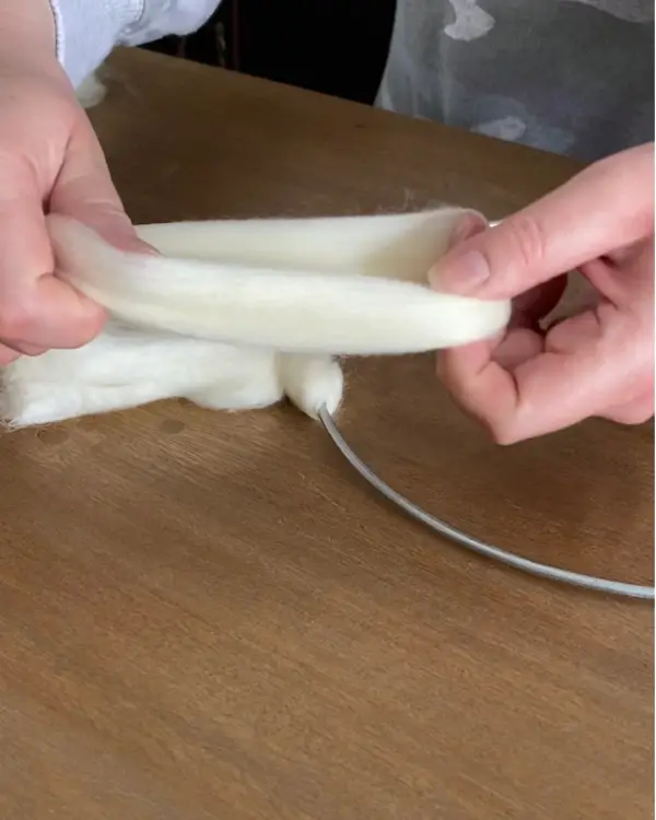 start by making a loop with the yarn