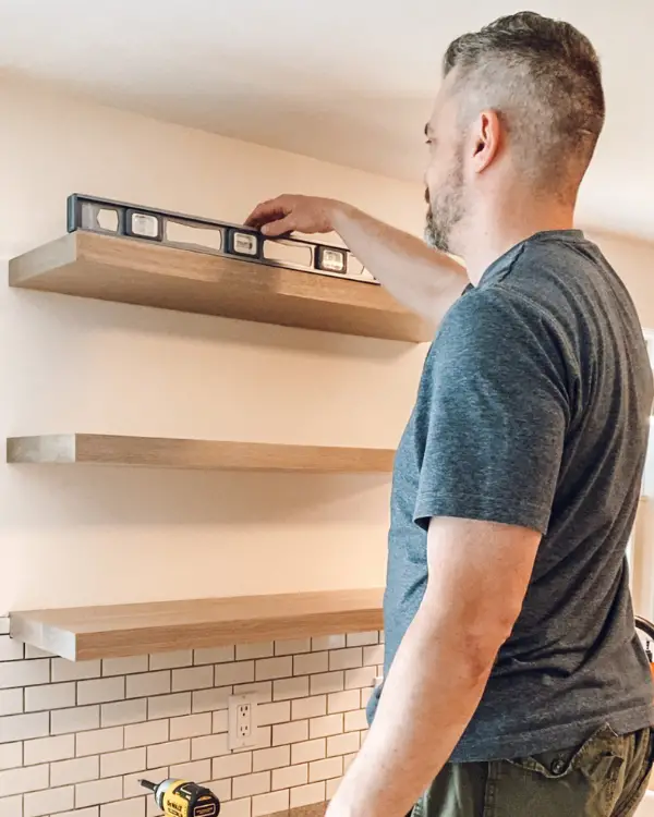 Making sure the shelves are level