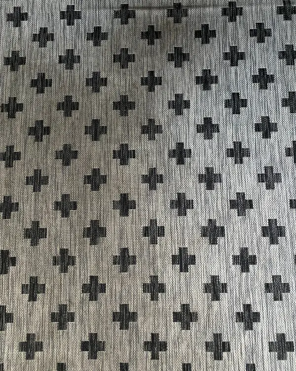 a close up of the rug before it was cleaned
