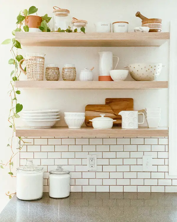 A kitchen shelfie with lots of cute accessories