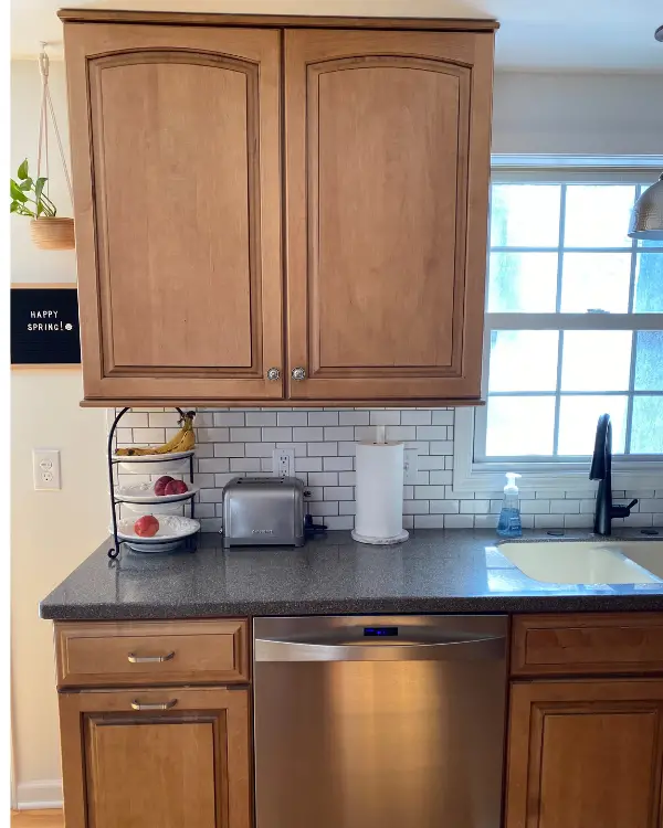 This cabinet was removed and replaced with open shelves.