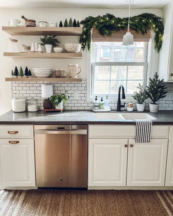 Christmas trees on the counter is a simple way to decorate the kitchen for Christmas.