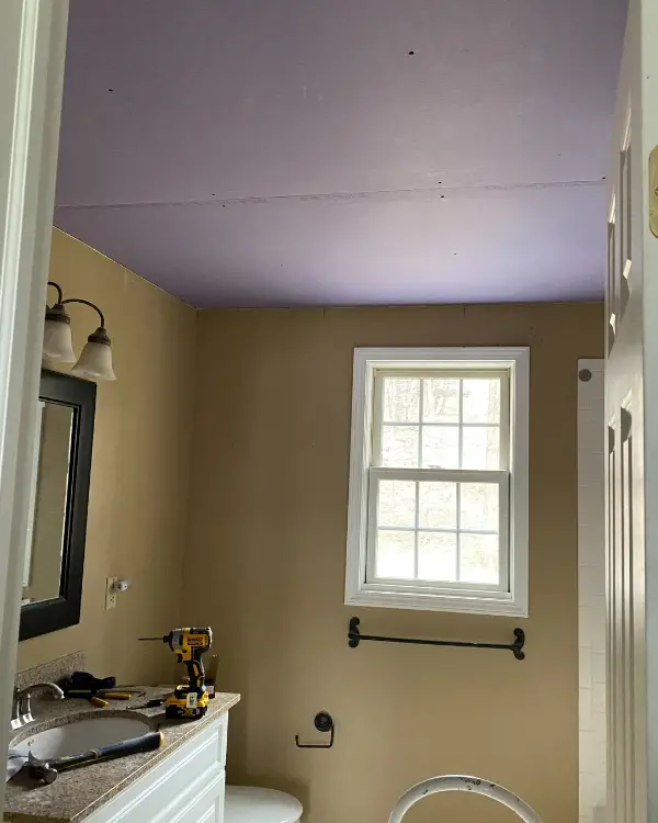 Getting in the new ceiling as part of the bathroom remodel design