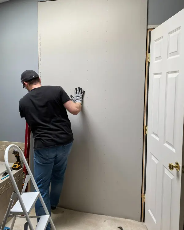 filling the doorway with drywall