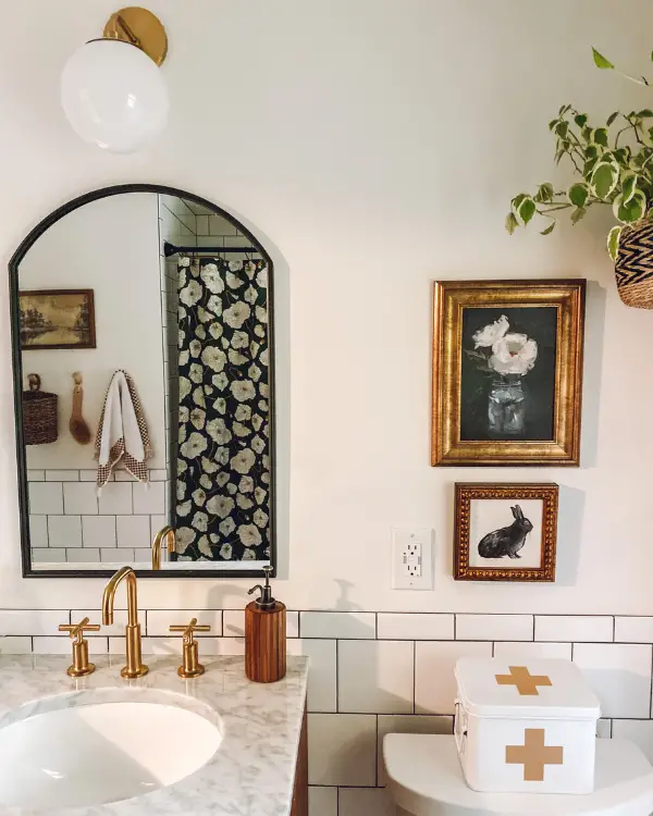 Beautiful art and shower curtain as part of the bathroom makeover