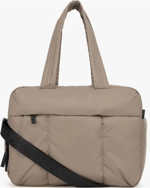 This cute and roomy carry on is a travel must have!