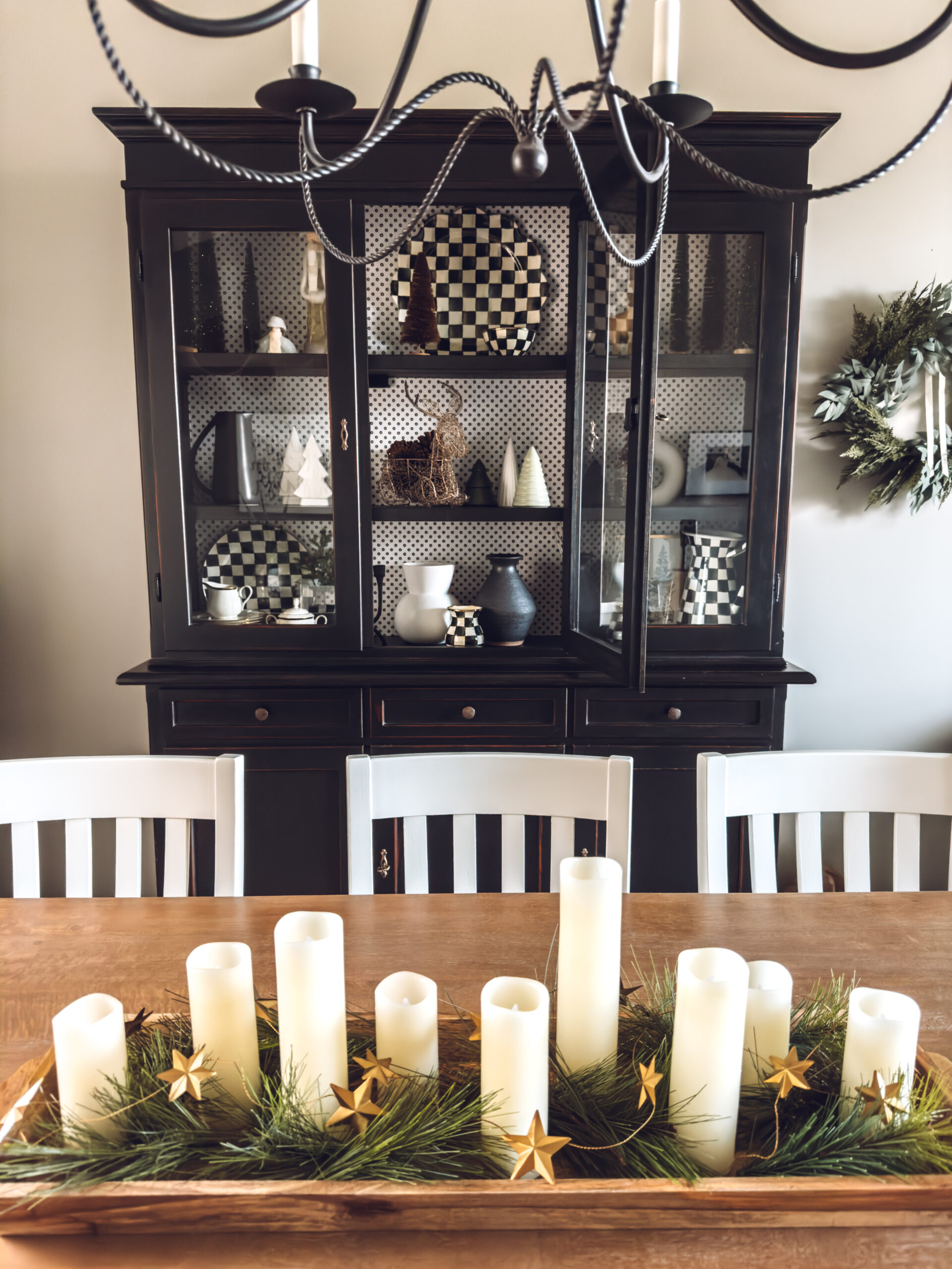 Using flameless candles to style a tray for Christmas