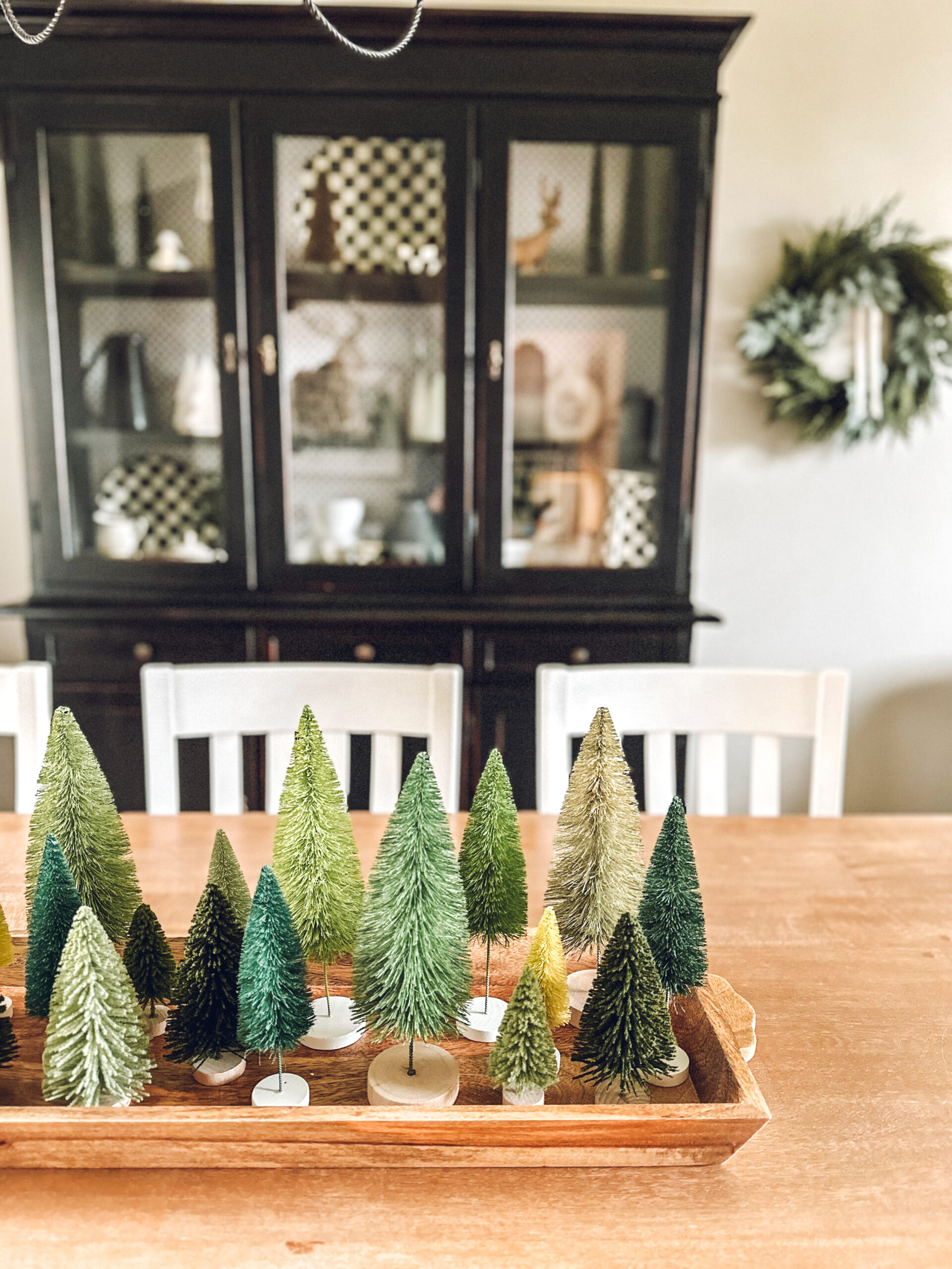 Using bottle brush trees to style a tray for Christmas