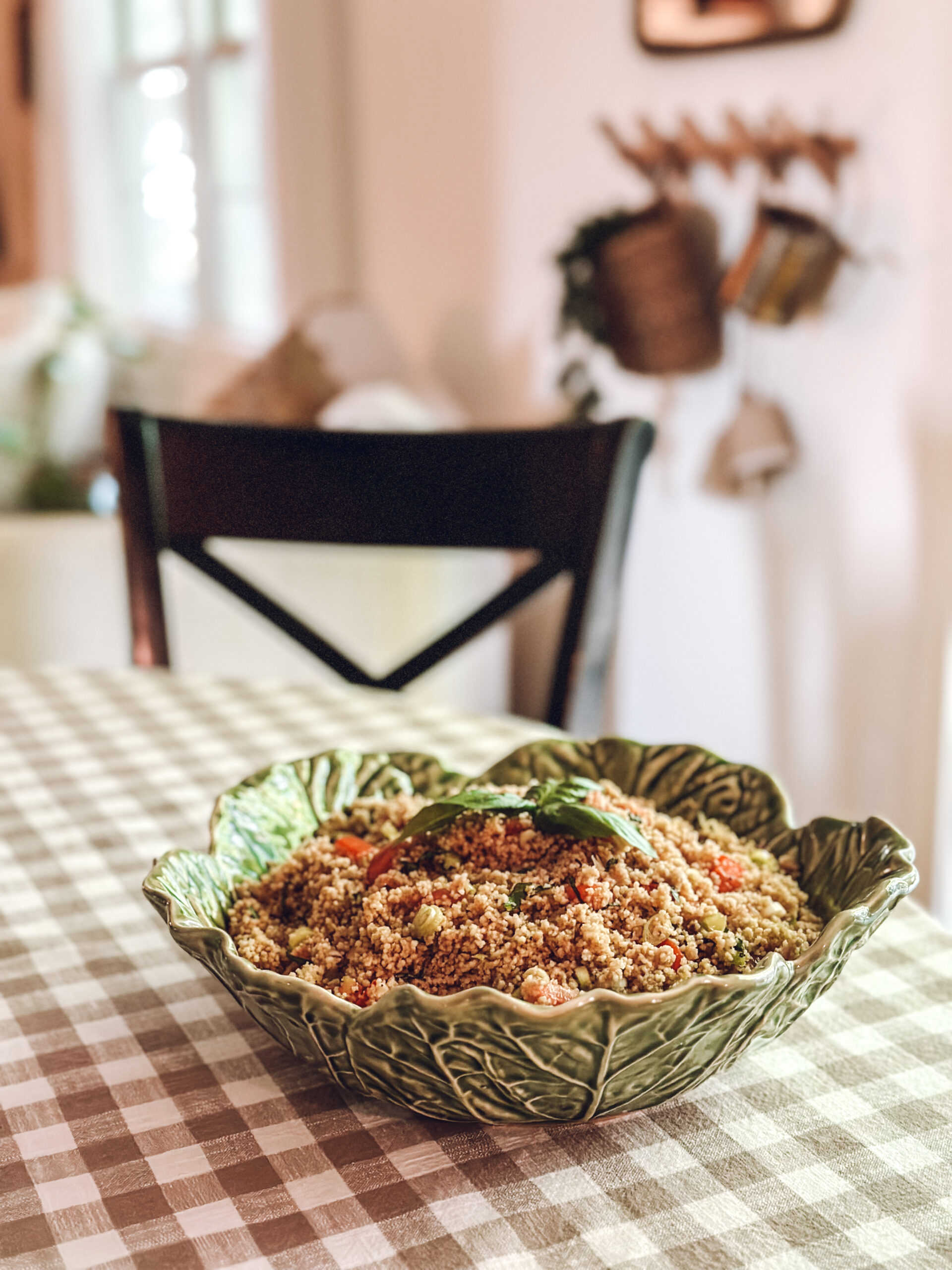 couscous salad with tomatoes, basil and scallions