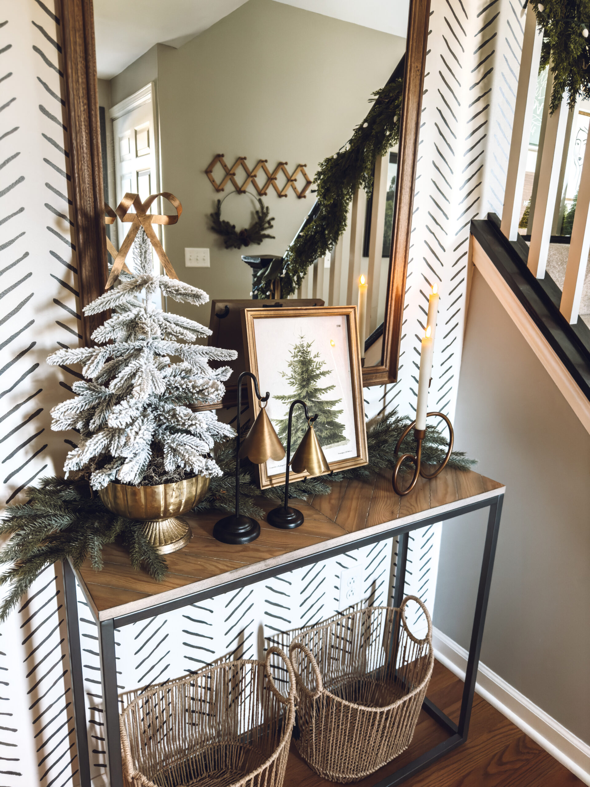 Little Christmas tree in a brass compote bowl with a brass bow on top