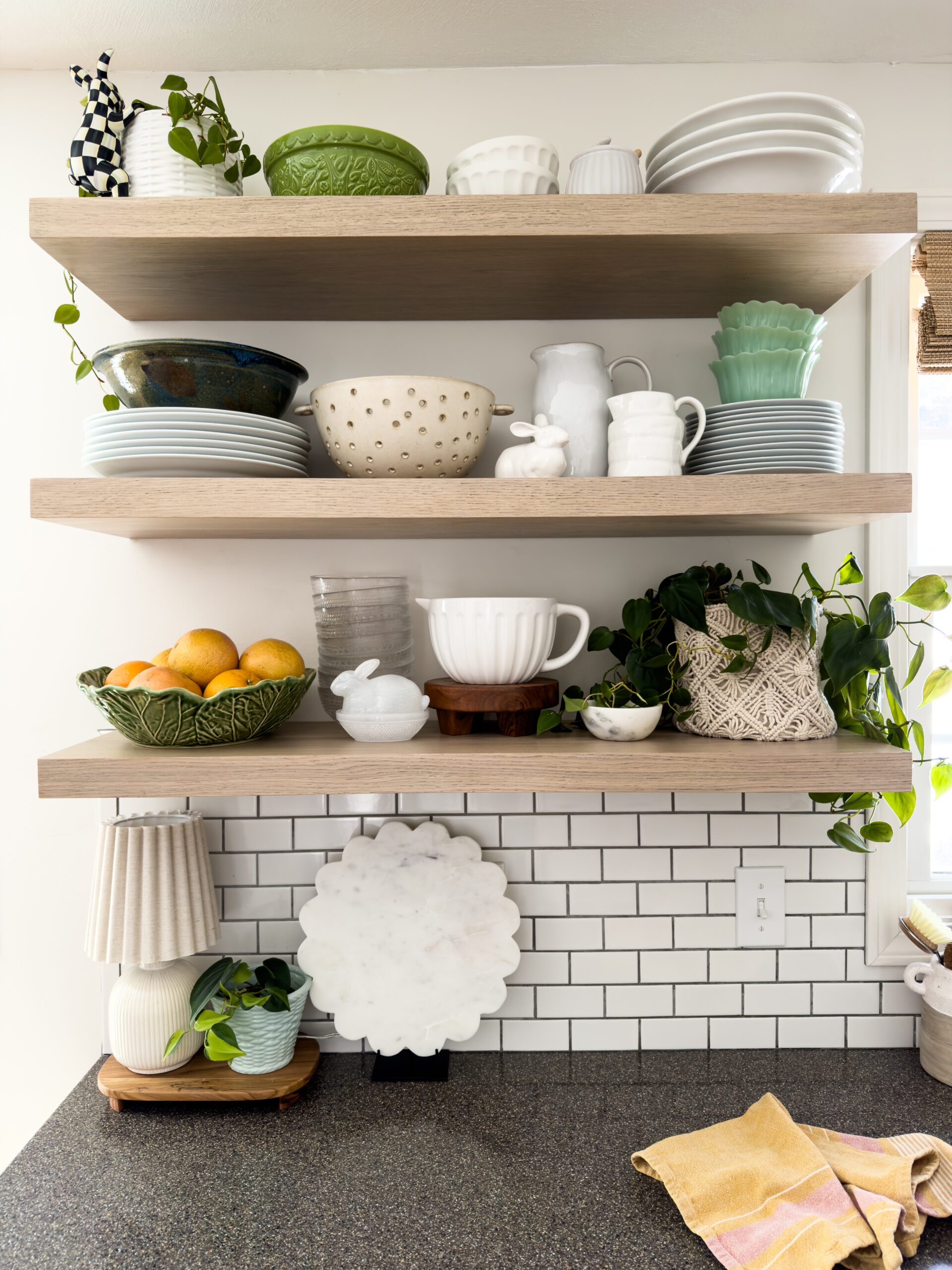 open shelves in the kitchen with touches of spring
